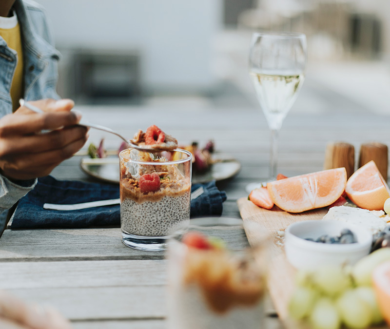 couple enjoying healthy food outdoors